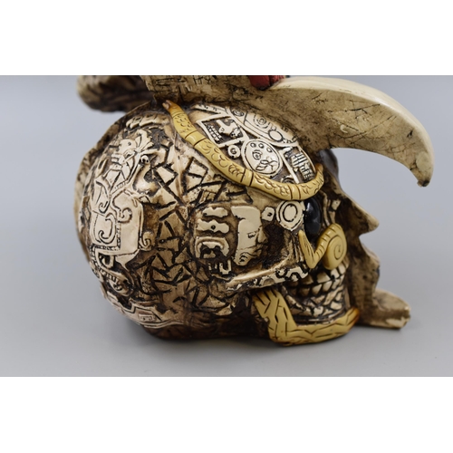 325 - Handcrafted Mexican Human Skull in Birds Mouth (Height 7.5