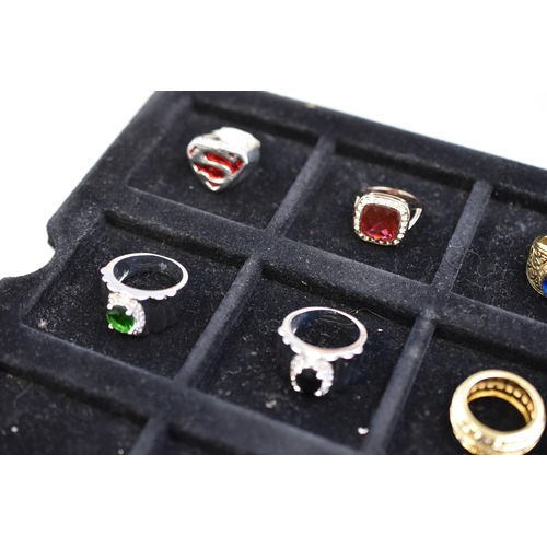 158 - Selection of Rings Including United States Marine Corps, Superman Logo and More