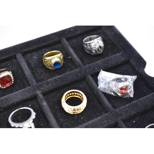 158 - Selection of Rings Including United States Marine Corps, Superman Logo and More