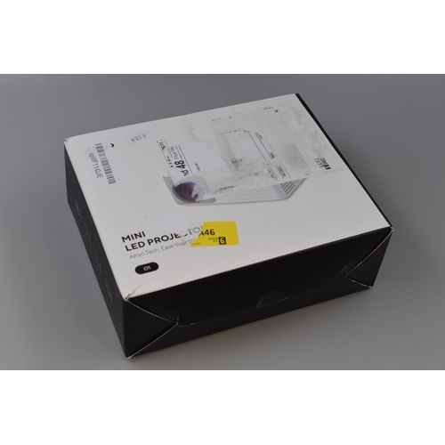 439 - Brand New Boxed Mini Digital Projector complete with Remote, Leads and Attachments Powers on when te... 