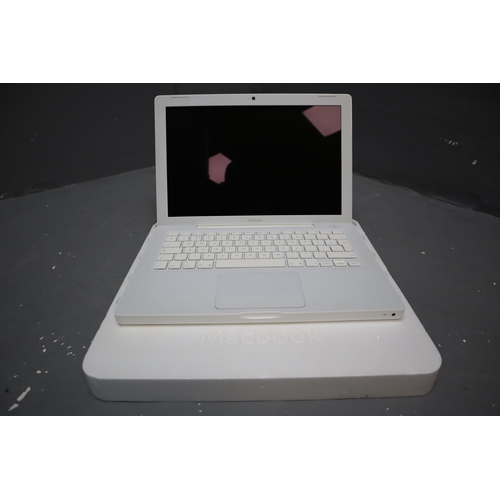 579 - Boxed Apple Macbook. Untested. No Power Supply. House Clearance Item.