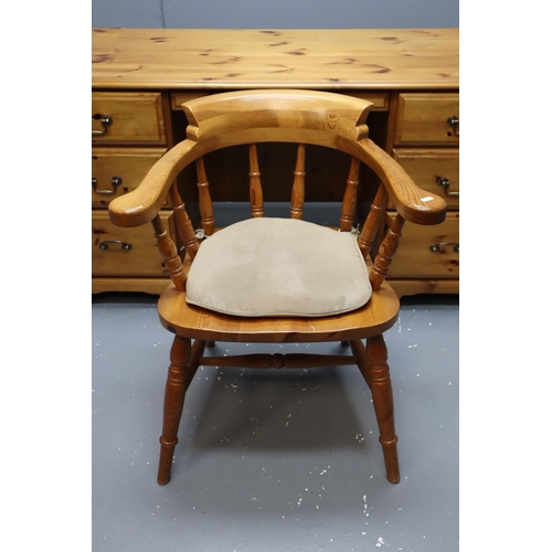 620 - Large pine desk with three large drawers, one small centre drawer and a cupboard with shelf and chai... 