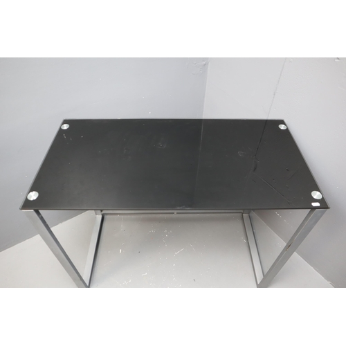 624 - Steel frame table in grey with dark tint glass top measures 39