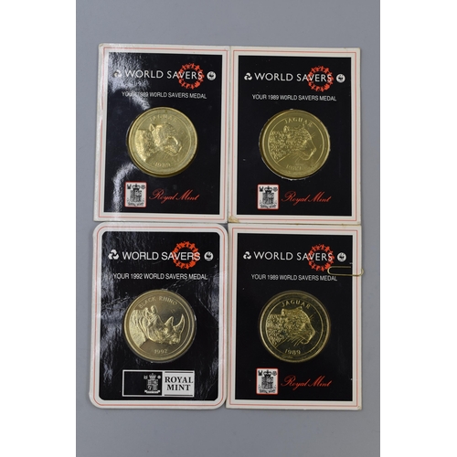 192 - Four Royal Mint World Savers Medals in Original Packaging. x3 1989 and x1 1992