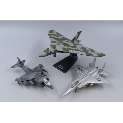 229 - A Diecast Metal “Vulcan” Bomber, Diecast US Fighter and a Kit Built Harrier Jump-Jet