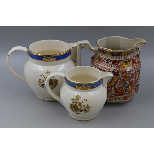 206 - Three Ceramic Jugs To Include Pair of 'Dutch' Oriental Style Jugs and Other. Tallest Approx 6.5