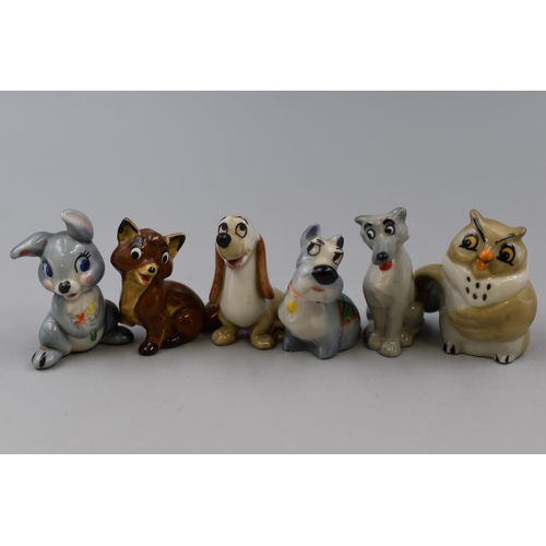 264 - Collection of 13 1960's miniature figurines including Disney's Lady and the tramp and Bambi