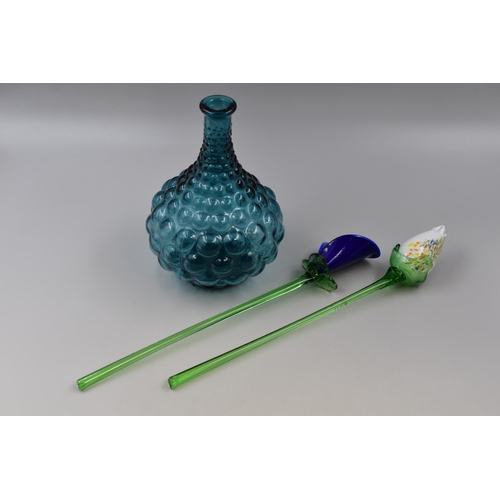 296 - An Empoli Glass Decanter (No Stopper), With Two Murano Style Glass Flowers