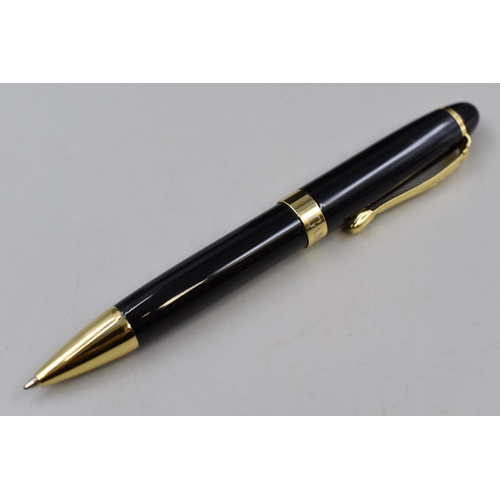 64 - A Gamages Omniscient Watch (Working), With Gamages Black and Gold Tone Ball Point Pen