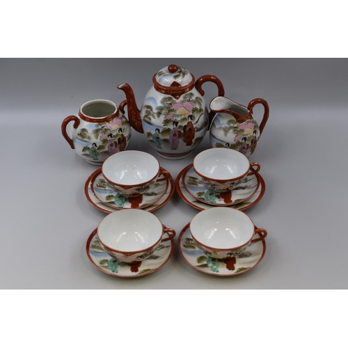 349 - Oriental tea service to include 4 cups 4 saucers, 2 side plates, teapot, jug 7 bowl. Hairline crack ... 