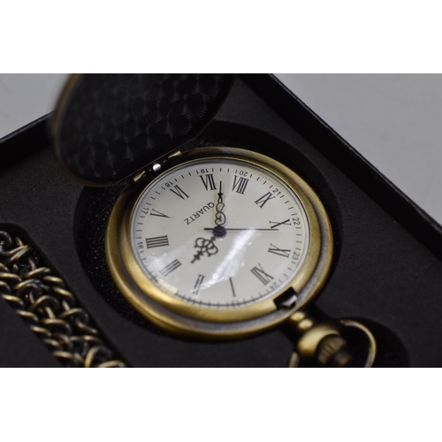 123 - Treeweto pocket watch in antique brass colour with fob chain in presentation box and sleeve in worki... 