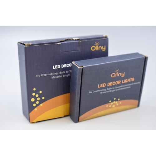 388 - Two New Boxed Ollny LED Lights