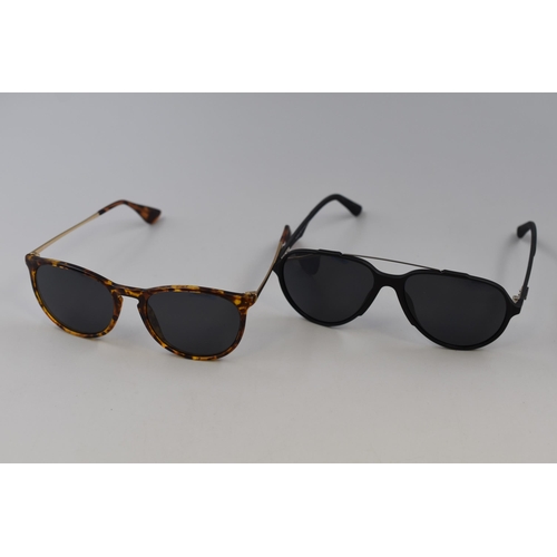 394 - Two Pairs of Brand New Boxed Designer Sunglasses to include Pukclar and Sungait