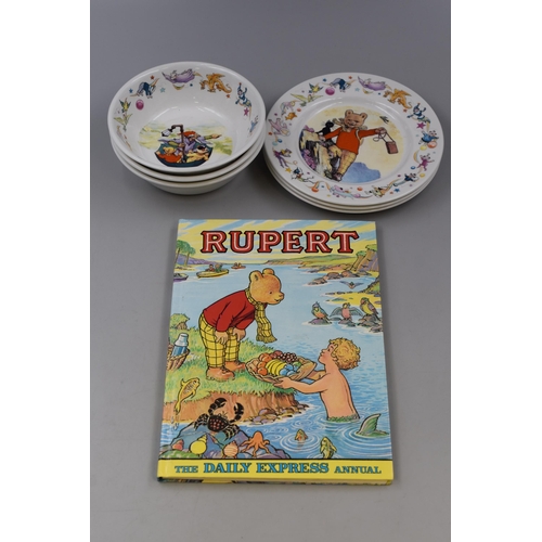 469 - A Set of Three Wedgwood Rupert The Bear Bowls With Plates, And Rupert The Bear Annual