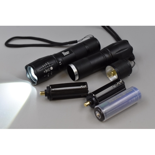 399 - Two New Torches with 8 Rechargeable Batteries (3800MAH) and Charger. In Packaging