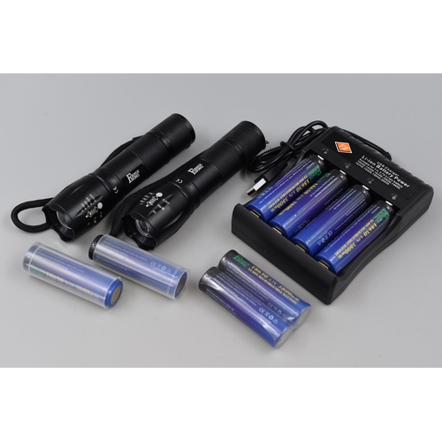 399 - Two New Torches with 8 Rechargeable Batteries (3800MAH) and Charger. In Packaging