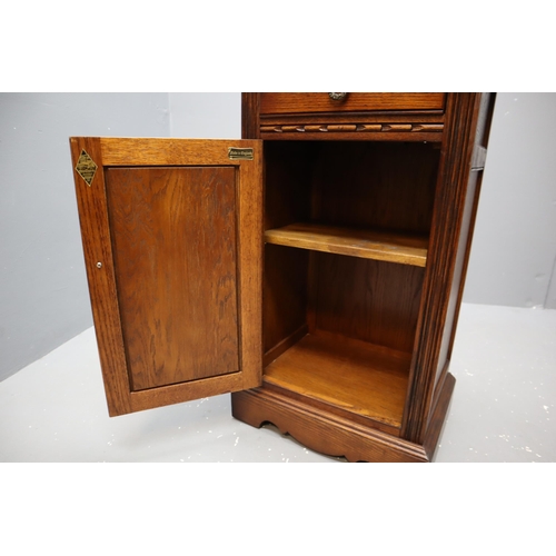 583 - English made dark wooden decorative cupboard with single drawer and long shelf approx (32