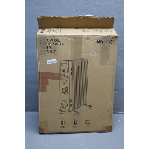 779 - Brand New Boxed 2500watt Oil Filled Radiator with Built in Timer and Twin Heat settings Powers on Wh... 