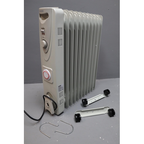 779 - Brand New Boxed 2500watt Oil Filled Radiator with Built in Timer and Twin Heat settings Powers on Wh... 