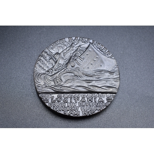 A British produced propaganda replica medal. The original being designed in Germany to commemorate the sinking of the 'Lusitania'.