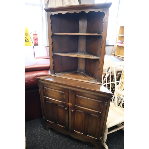 A two piece dark wood shelved vintage corner unit, 66" total height x 33" wide x 19" deep