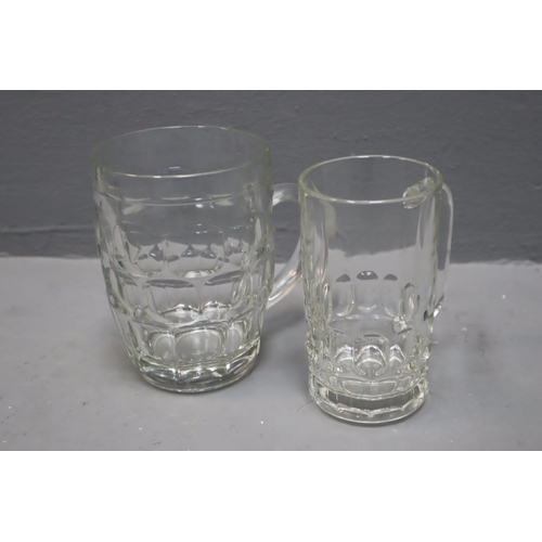 765 - A Large Selection (Three Boxes) of Assorted Drinking Glasses. Includes Etched Glassware, Tankards, S... 