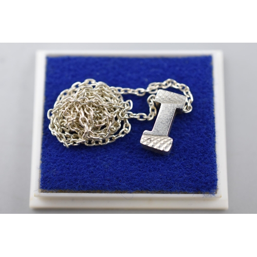 44 - Silver plated letter I necklace, plus a silver plated brooch, plus two crystal pendants and more.