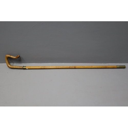 311 - Antique bamboo sword walking cane with brass collar.