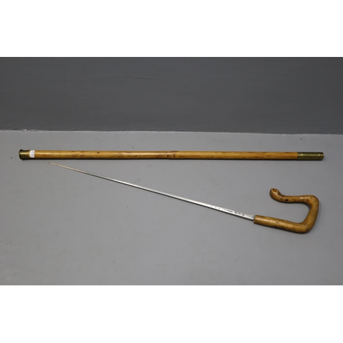 311 - Antique bamboo sword walking cane with brass collar.