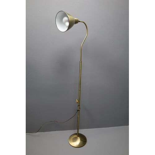 559 - Brass effect standard/reading lamp with foot switch measures 61