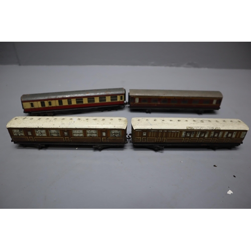 339 - A Selection of Model Railway Accessories To Include Buildings, Carriages, Signs, Kiosks, And More