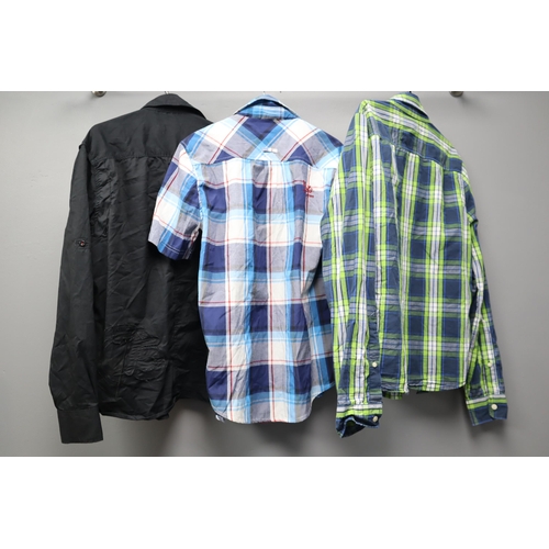 568 - Three mens designer shirts size small to include Varsity, Hollister and Jack and Jones