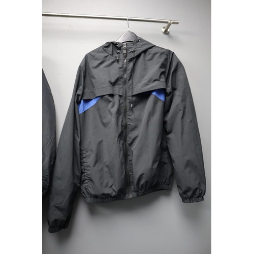 565 - Two mens waterproof jackets size small one by Box Fresh in Black / blue and one Rockport in Black pl... 