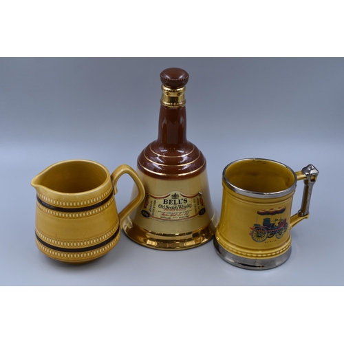 226 - Bells Old Scotch Whisky' 10 inch Wade pottery, Ceramic Bell Shape Decanter, large Sadler jug, 5