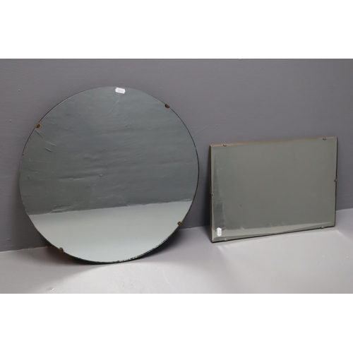 620 - Two heavy vintage mirrors one 18