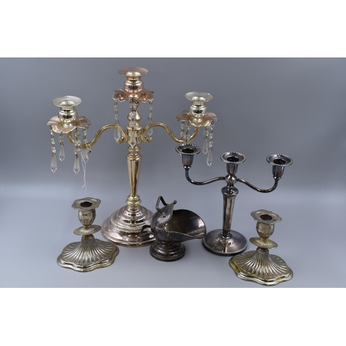 690 - Selection of electro plated items to include pairs of candle sticks, 5