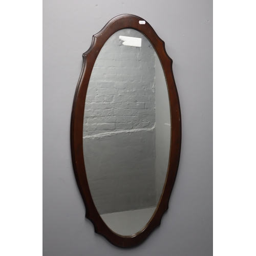 401 - Large hanging wall mirror with bevelled wooden frame 38