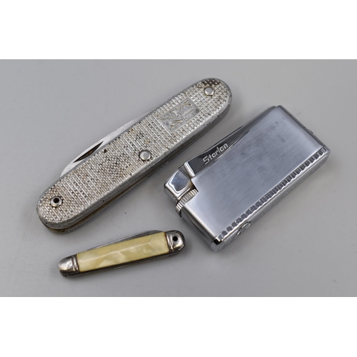 242 - Starlon Jet Flame S lighter, KL74 Dutch army pen knife and a miniature pen knife