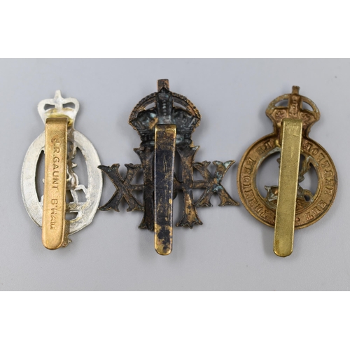 248 - Three Military Badges including Hertfordshire Regiment, Hertfordshire Yeomanry, and a 20th Hussars