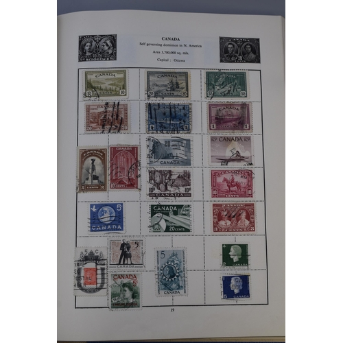 416 - A Stamp Book Containing a Large Selection of British and Worldwide Stamps To Include Canada, Germany... 