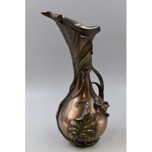 253 - Veronese bronze effect lily vase jug. Approx 14