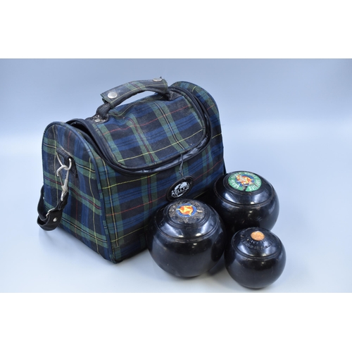 645 - Set of Bias 2 lawn bowls with jack in a Kelly's lawn bowls carry bag