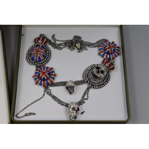 439 - Four Designer Statement Necklaces To Include Union Jack, Cobra, Big Cat Earring Necklace Set, And La... 