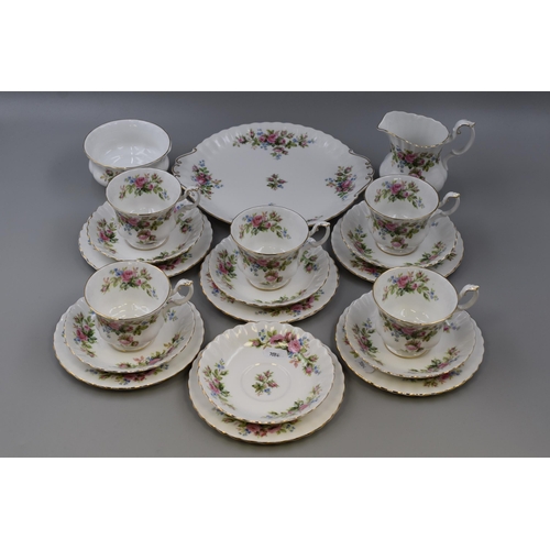 264 - A Twenty Piece Royal Albert 'Moss Rose' Tea Set. Includes Five Trios, Milk Jug, Sugar Bowl, Sandwich... 