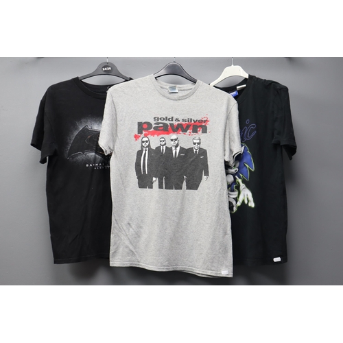 715 - Three Small Pre-Owned Promotional T-Shirts to include Batman V Superman, Sonic and Gold and Silver P... 