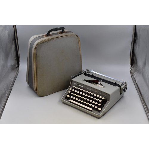 742 - A 1960's Remington Travel-riter Deluxe Typewriter, In Carry Case