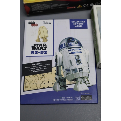 748 - A Selection of Toys To Include R2-D2 Wood Model, Battleship, Transformers, Hot Wheels and More