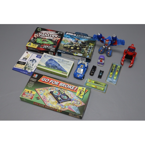 748 - A Selection of Toys To Include R2-D2 Wood Model, Battleship, Transformers, Hot Wheels and More