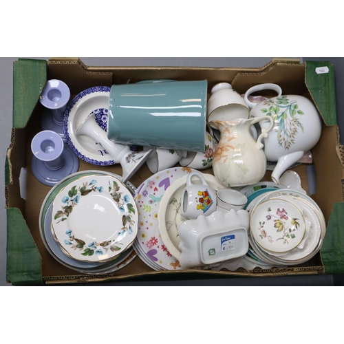 760 - Large selection of pottery and ceramics to include candle sticks, plates, bowls, tea pot and much mo... 