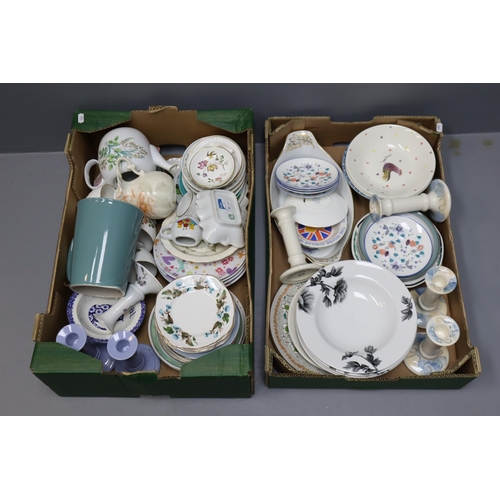 760 - Large selection of pottery and ceramics to include candle sticks, plates, bowls, tea pot and much mo... 